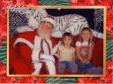 Reanna and Macy with Santa at Bush Gardens 2008