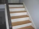 Stairs before new railing and carpeting