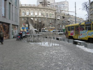 Giant show outside the mall.  It is made of pots and lids, but they added a sleigh and reindeer for Christmas.
