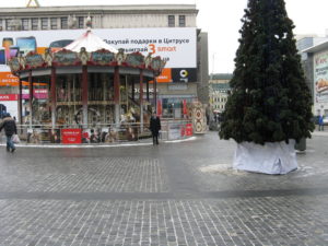 Dad in front of the carousel between the malls.
