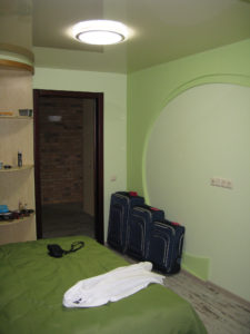 Another view of our bedroom from the balcon - the suitcases are not stored - the door goes out into the hall - notice the nice shelves