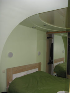 Our bedroom taken from the balcon that it opens up on - the mirrors actually close on a double closet.  The bed is sort of queen sized but maybe not exactly as no beds are the same size - you buy sheets and all but size not kind.