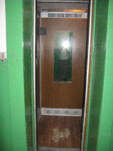 Smaller elevator opened - this one is well lit the other is larger but very dim.