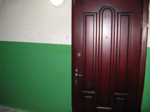 The door to our apartment. Door bell on the left.