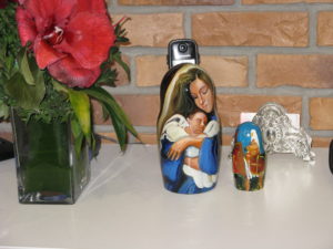 I set these together on the other side of the room as it is Mary and Jesus and the other one is the wise men. Since the wise men came to visit Jesus later I like having them separate.