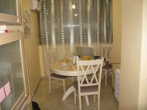 This is our eating area - it is like a  "breakfast nook" and very comfortable.  The computer is no longer on it - it is in our balcon (not a misspelling - that is what they call it)on a separate table