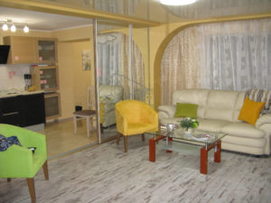 Other side of living room looking toward the kitchen - the couch is a hide a bed