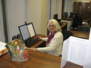 Here I am at my desk. The missionary who took this picture insisted I put up Russian papers but I doubt you can see it. Yes, I do sometimes type in Russian, even in Ukrainian, but mostly I work in English.