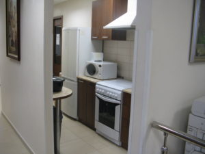 Down the short hall from my desk is our office kitchen - just a small kitchen which is fine to heat our lunch in. We also use it to prepare and serve lunches to those who come in for meetings, like the mission leaders conferences held once every six weeks. Then it is very inadequate but we make it work.