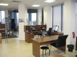 Here is a view of my desk from the hall outside the kitchen. We use the table to serve at the conferences that are held in our office or at other times when we have someone visiting.