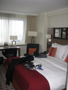 Here is the bed in our room with the window that has a great view of the city - especially the old town.