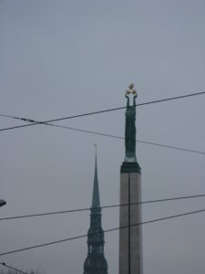 Here is a close up of the monument. It is a copper figure of Liberty lifting three gilded stars.