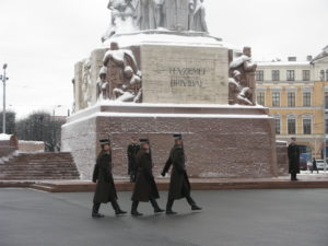 Marching in great precision the new guards come out.