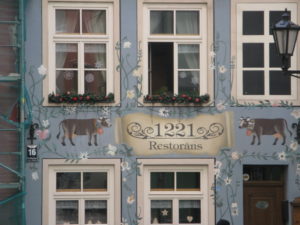 Here is the sign on the blue house. It is actually quite famous and you can google it.