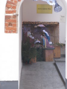 This nativity is in an alcove of a building.