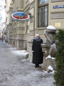 One of the restaurants we passed had a statue of two wooden frogs. that's me standing near them.