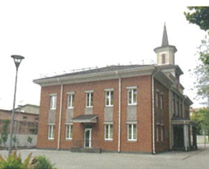 We attend a fairly new branch building. The chapel is on the second floor. It is not on the street but behind another apartment building and is all fenced in with a guard living there. It is a very nice building.