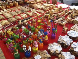 There were lots of sections with little hand made crafts and also with handmade jewelry - beads and braided. It was all so interesting to see. The local artists use a lot of color in their painting and there are so many different things to see.