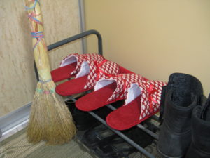 Valentine slippers and our small broom.