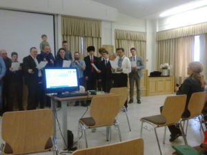 The missionaries were all on one side but they all sang as well.