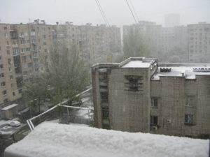 See the snow falling and coating everything.