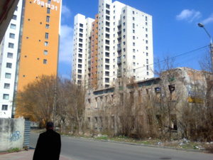 Another view of the apartments close to ours that are very nice with the run down buildings near by. At the right is actually another school - perhaps another kindergarten or day care as it is mostly young children and there are interesting things to play with and on in the front.