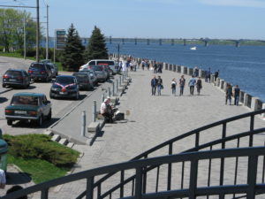 Crossing over the walkway we decided to continue walking to the other side. We looked down on the walkway and saw two men sitting on the side playing instruments.