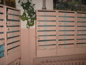 These are the mailboxes in our apartment - there are no keys so you would probably not want your mail to come here - but our utility bills are delivered here so we check for those. Our box is on the top just to the left of the plant.