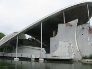 In the middle of the river is an outside theater. This is the area behind the stage on the water side.