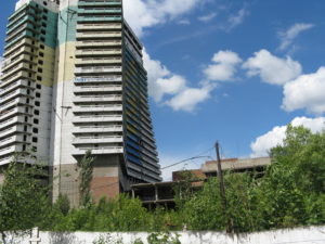 The abandoned building and a building attached to it.