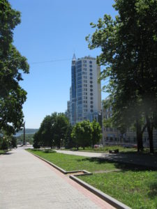 Back outside we are walking toward the river and that tall statue is the Victory Monument.