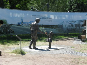 I like this statue of the little girl giving the soldier an apple.