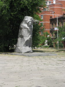 This Monument to Alexander Matveyevich Matrosov is in kind of the parking lot of the bank - interesting.