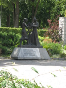 This statue is also in the parking lot. It seems to be a woman and a man and perhaps a plant of some kind. I couldn't find anything to say what it is.but the words say "Legends of How We Were." Interesting.