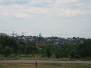 Past the field more housing.