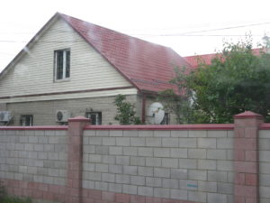 Here is another home behind a brick wall on the way back home.