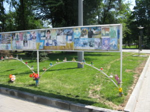 These seem to be pictures pasted on a wall perhaps by families and some others perhaps by an organization. The dates are as current as 2017.