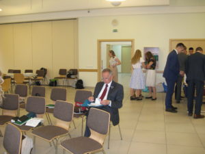 Elder Morgenegg going over the various receipts he received from the missionaries.